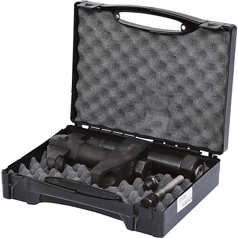 Schwarzer Werkzeugkoffer, geöffnet, mit Schaumstoff und Werkzeugen.